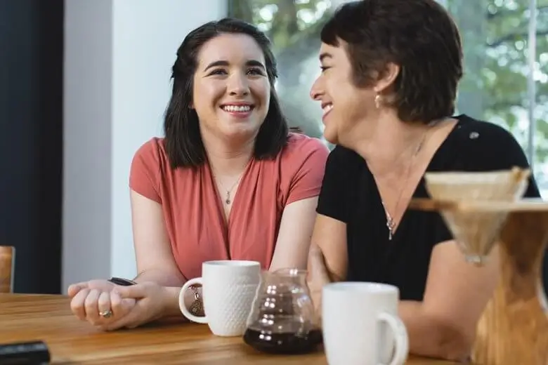 mother and daughter with vns therapy having a coffee